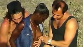 African Beauty Enjoys Interracial Threesome With Two White Men By The Seaside